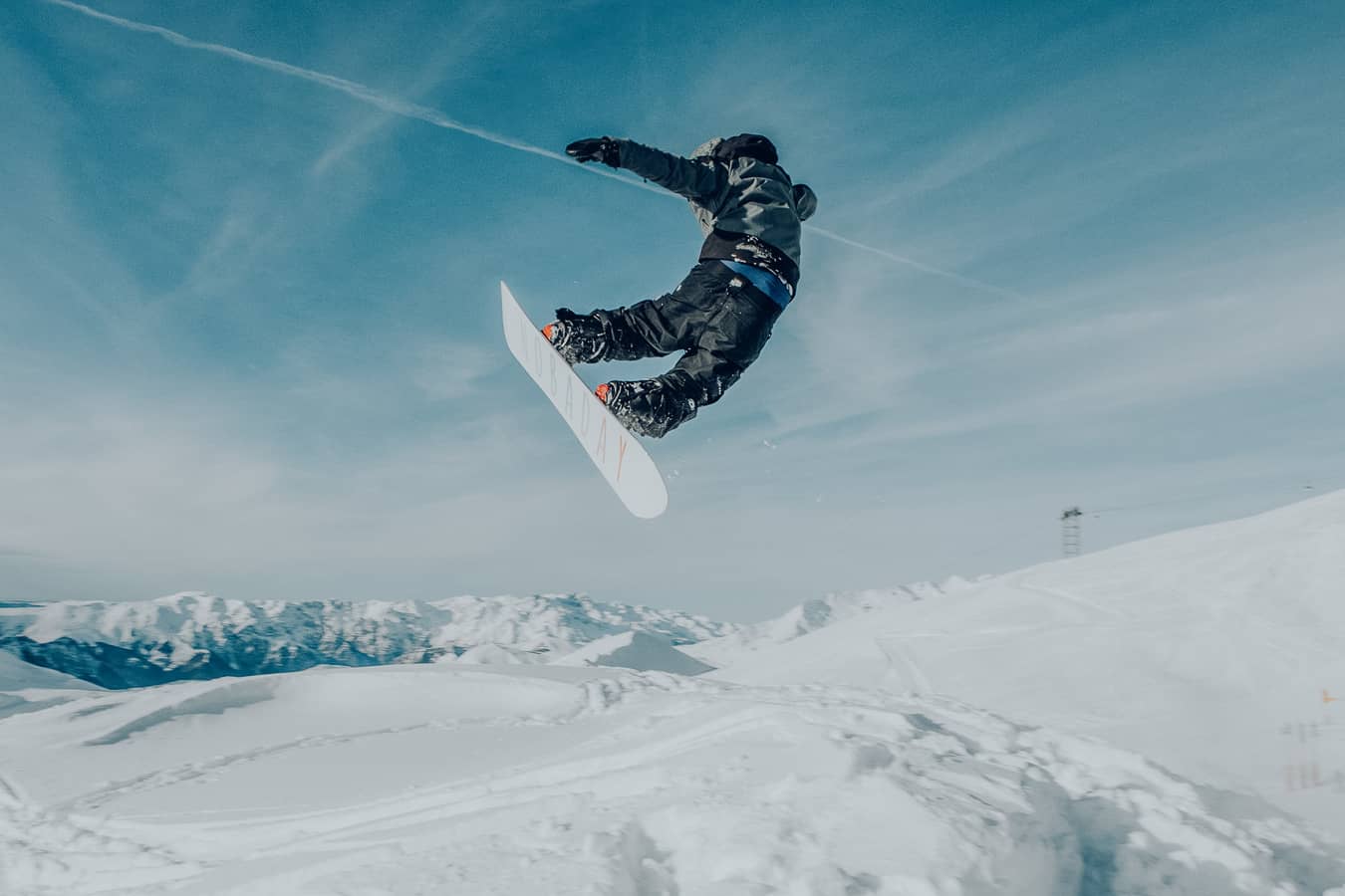 A snowboarder in the air